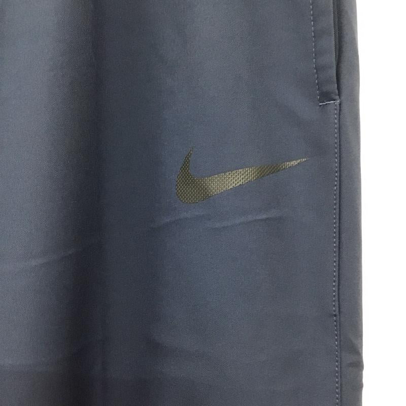 ナイキ NIKE ボトムス ボトムス 927381-471 トレーニングパンツ DRI-FIT WOVEN TEAM スポーツウェア タグ付き XL ワンポイント 紺 / ネイビー / メンズ USED 古着 中古 10135586