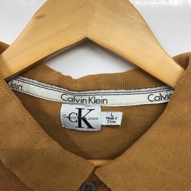 カルバン・クライン Calvin Klein ポロシャツ 半袖 半袖ポロシャツ 半袖カットソー カラーシャツ L ロゴ、文字 茶 / ブラウン / メンズ USED 古着 中古 10131112