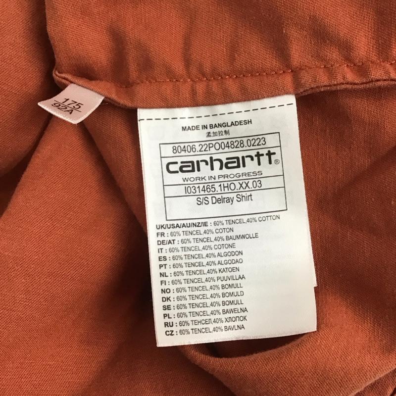 カーハート Carhartt シャツ、ブラウス 半袖 半袖シャツ 前ボタンシャツ カジュアルシャツ M ロゴ、文字 橙 / オレンジ / メンズ USED 古着 中古 10125749