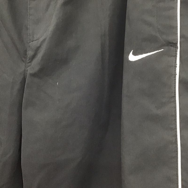 ナイキ NIKE パンツ ワークパンツ、ペインターパンツ ワークパンツ ワイドパンツ カジュアルパンツ ナイロンパンツ 無地 黒 / ブラック / メンズ USED 古着 中古 10138425
