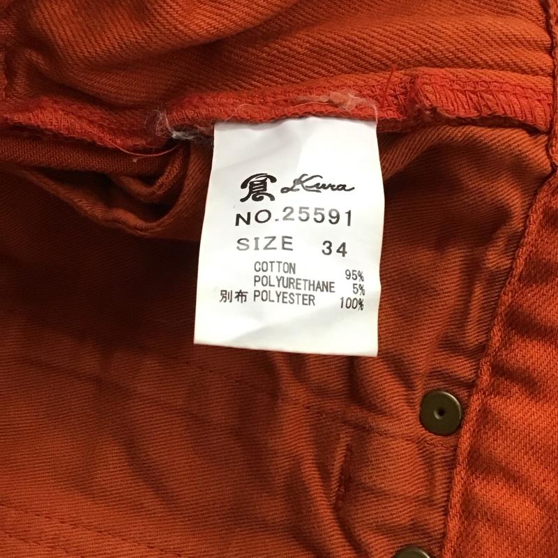 クラ 倉 パンツ デニム、ジーンズ デニムパンツ スリムパンツ カジュアルパンツ ストレッチパンツ 34インチ ロゴ、文字 橙 / オレンジ / orange メンズ USED 古着 中古 10156579