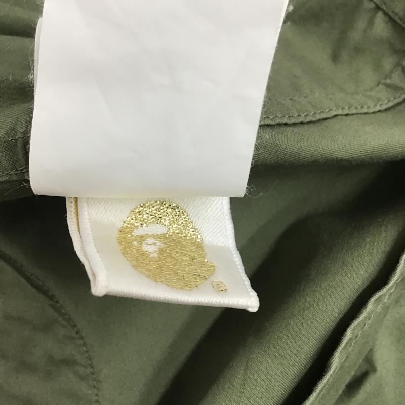 アベイシングエイプ A BATHING APE シャツ、ブラウス 半袖 半袖シャツ プリントシャツ ポケットシャツ M ロゴ、文字 カーキ / カーキ / khaki メンズ USED 古着 中古 10160506