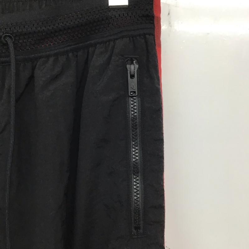ナイキ NIKE パンツ ワークパンツ、ペインターパンツ 19SS ナイロンパンツ ワイドパンツ スポーツウェア M ロゴ、文字 黒 / ブラック / メンズ USED 古着 中古 10136201