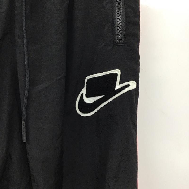 ナイキ NIKE パンツ ワークパンツ、ペインターパンツ 19SS ナイロンパンツ ワイドパンツ スポーツウェア M ロゴ、文字 黒 / ブラック / メンズ USED 古着 中古 10136201