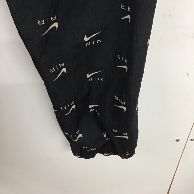 ナイキ NIKE パンツ ワークパンツ、ペインターパンツ dv8059-010 ウインドロングパンツ スポーツウェア ワイドパンツ XL ロゴ、文字 黒 / ブラック / レディース USED 古着 中古 10134574