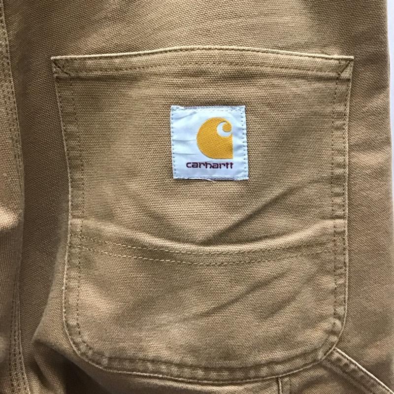 カーハート Carhartt パンツ ワークパンツ、ペインターパンツ ワークパンツ ワイドパンツ カジュアルパンツ 32インチ ロゴ、文字 ベージュ / ベージュ / メンズ USED 古着 中古 10116345