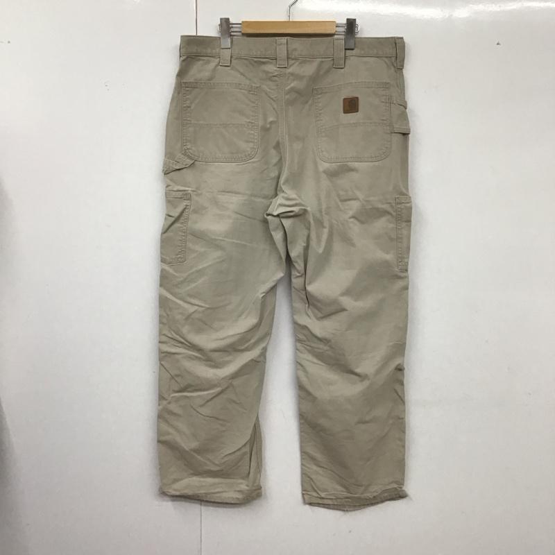 カーハート Carhartt パンツ ワークパンツ、ペインターパンツ ワークパンツ ワイドパンツ カーゴパンツ 38インチ ロゴ、文字 ベージュ / ベージュ / メンズ USED 古着 中古 10127417