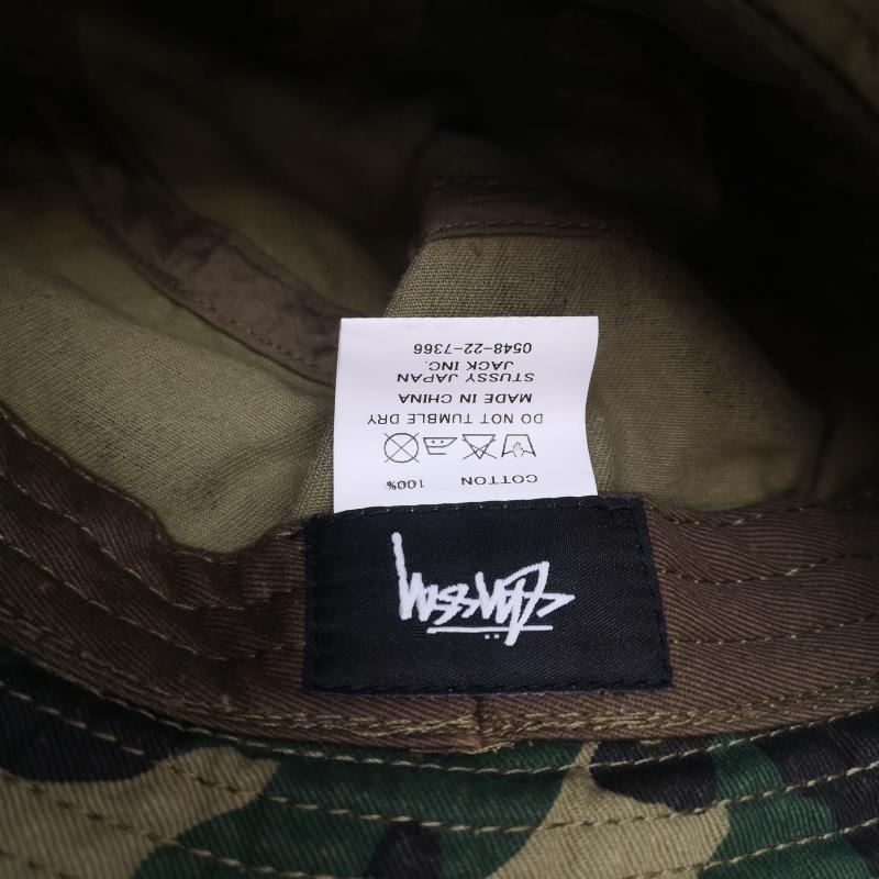 ステューシー STUSSY 帽子 ハット ストック ロゴ 刺繡 迷彩 バケット ハット キッズ 子供 - オリーブグリーン / オリーブグリーン / ボーイズ USED 古着 中古 50151920