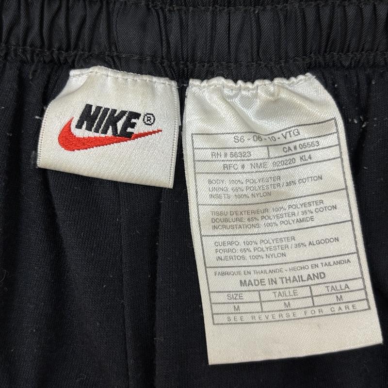 ナイキ NIKE ボトムス ボトムス 90年代 ビンテージ タイ製 サイドボタン ナイロン トラック パンツ 90s VINTAGE M 黒 / ブラック / black メンズ USED 古着 中古 50162652
