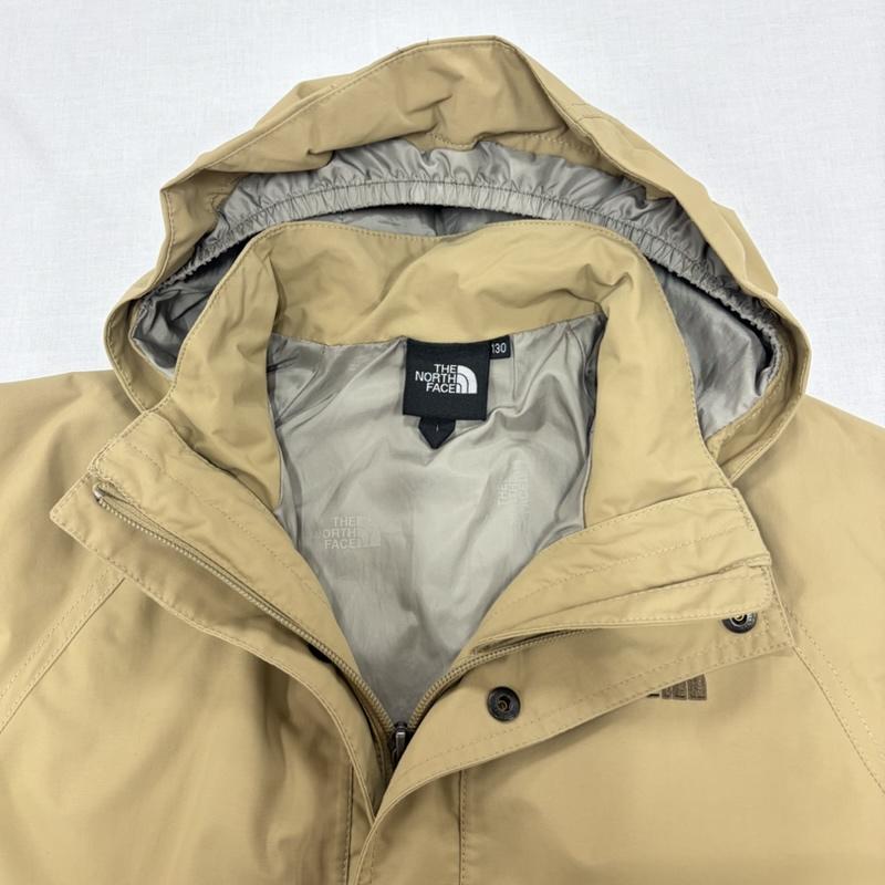 ザノースフェイス THE NORTH FACE ジャケット、上着 ジャンパー、ブルゾン ナイロン ジャケット マウンテンコート ロゴ 刺繍 NPJ61808 防水 キャンプ 130cm ロゴ、文字 X 刺繍 ベージュ / ベージュ / beige X 茶 / ブラウン / brown ガールズ USED 古着 中古 50163887