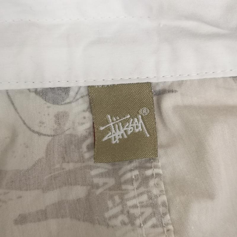 ステューシー STUSSY パンツ ショートパンツ 総柄 ハーフパンツ イージー ショート パンツ 36インチ 茶 / ブラウン / brown メンズ USED 古着 中古 50168300