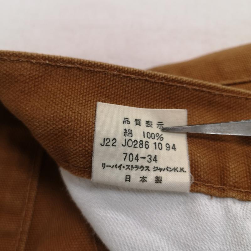リーバイストラウスアンドコー Levi Strauss & co. パンツ ワークパンツ、ペインターパンツ 90s 日本製 シンチバック ボタンフライ 白タブ 片面BigE ダック ワーク パンツ 704-34 28インチ 茶 / ブラウン / brown メンズ USED 古着 中古 50168571