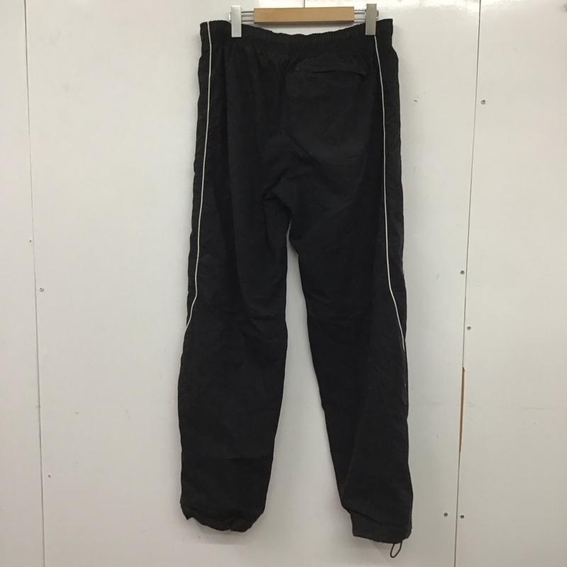 ナイキ NIKE パンツ ワークパンツ、ペインターパンツ ワークパンツ ワイドパンツ カジュアルパンツ ナイロンパンツ 無地 黒 / ブラック / メンズ USED 古着 中古 10138425
