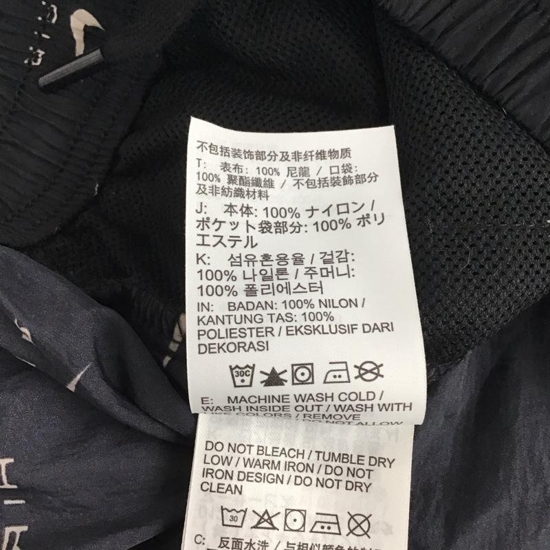 ナイキ NIKE パンツ ワークパンツ、ペインターパンツ dv8059-010 ウインドロングパンツ スポーツウェア ワイドパンツ XL ロゴ、文字 黒 / ブラック / レディース USED 古着 中古 10134574