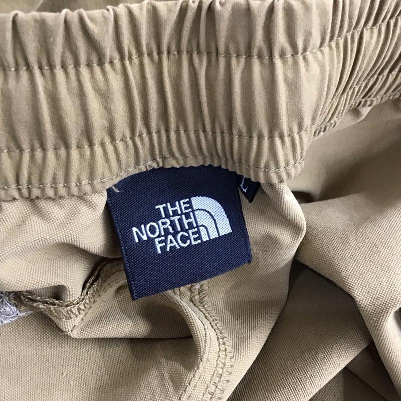 ザノースフェイス THE NORTH FACE パンツ ワークパンツ、ペインターパンツ nb81711 ドーロライトパンツ ワイドパンツ ストレッチパンツ L ロゴ、文字 ベージュ / ベージュ / メンズ USED 古着 中古 10130610