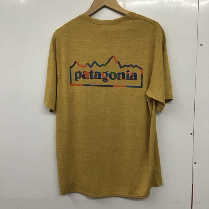 パタゴニア patagonia Tシャツ 半袖 半袖カットソー プリントTシャツ クルーネックカットソー M ロゴ、文字 黄 / イエロー / メンズ USED 古着 中古 10139823