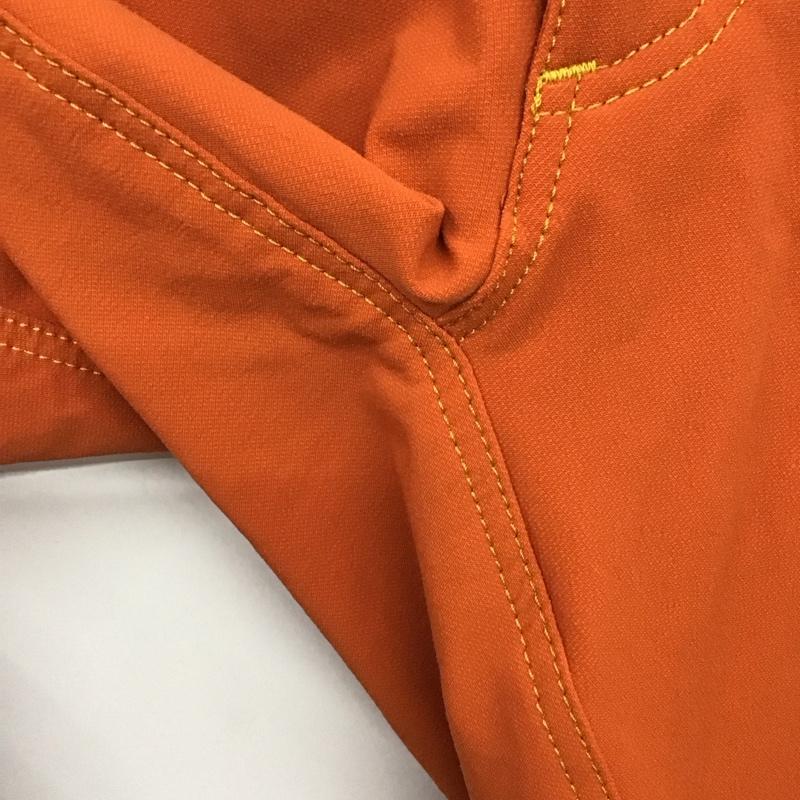 モンベル mont-bell パンツ ワークパンツ、ペインターパンツ 1105498 クリフパンツ スリムパンツ ストレッチパンツ L ロゴ、文字 橙 / オレンジ /  メンズ USED 古着 中古 10122004