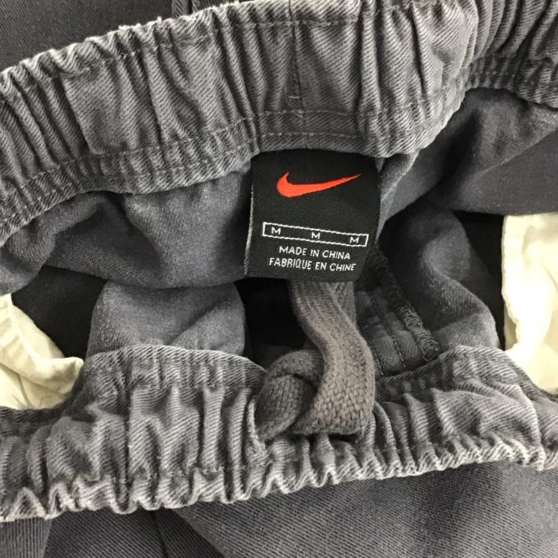 ナイキ NIKE パンツ ワークパンツ、ペインターパンツ ワイドパンツ カジュアルパンツ ワークパンツ M 無地 紺 / ネイビー / メンズ USED 古着 中古 10139650
