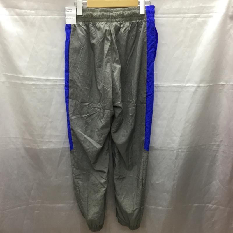 ナイキ NIKE パンツ ワークパンツ、ペインターパンツ fd0949-029 スポーツウェア ナイロンパンツ ワイドパンツ カジュアルパンツ M ロゴ、文字 灰 / グレー / メンズ USED 古着 中古 10110990
