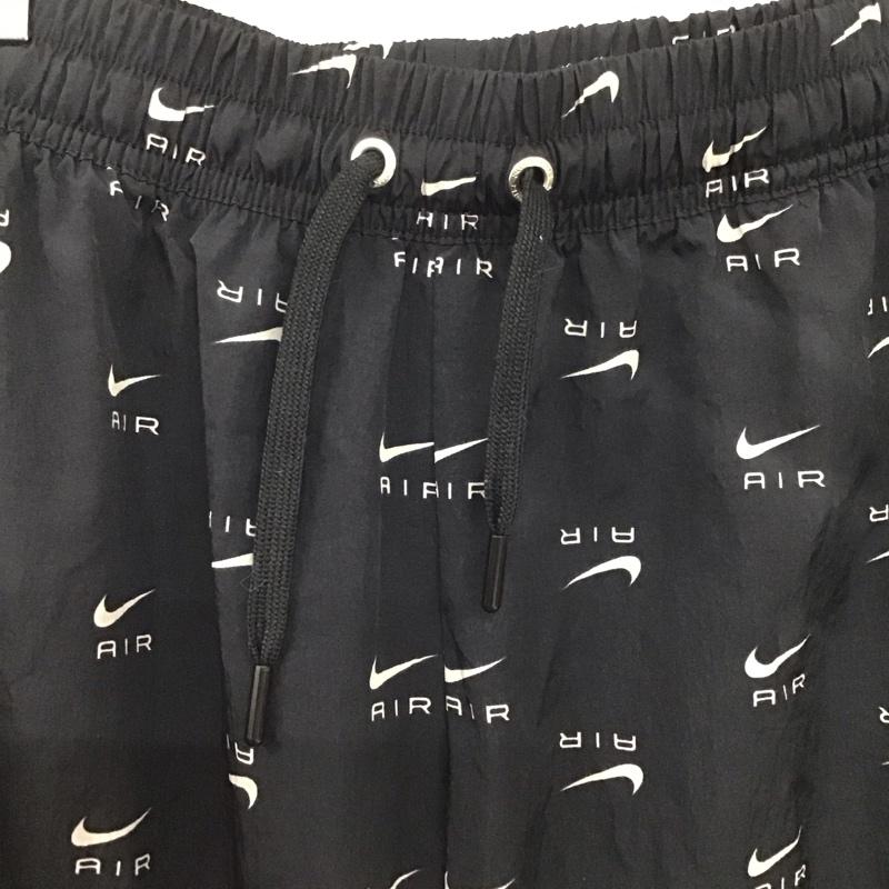 ナイキ NIKE パンツ ワークパンツ、ペインターパンツ dv8059-010 ウインドロングパンツ スポーツウェア ワイドパンツ XL ロゴ、文字 黒 / ブラック / レディース USED 古着 中古 10134574