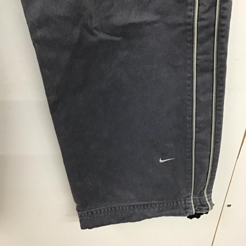 ナイキ NIKE パンツ ワークパンツ、ペインターパンツ ワイドパンツ カジュアルパンツ ワークパンツ M 無地 紺 / ネイビー / メンズ USED 古着 中古 10139650