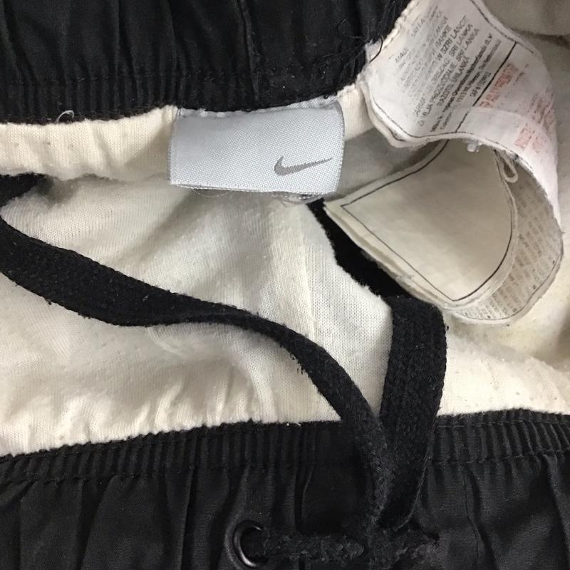 ナイキ NIKE パンツ ワークパンツ、ペインターパンツ ワークパンツ ワイドパンツ カジュアルパンツ ナイロンパンツ 無地 黒 / ブラック / メンズ USED 古着 中古 10138425