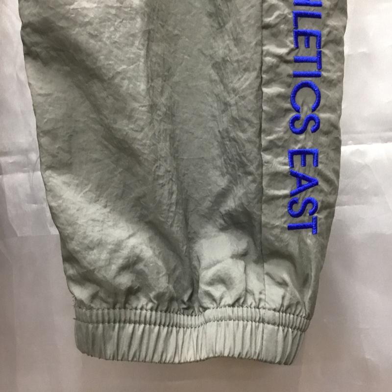 ナイキ NIKE パンツ ワークパンツ、ペインターパンツ fd0949-029 スポーツウェア ナイロンパンツ ワイドパンツ カジュアルパンツ M ロゴ、文字 灰 / グレー / メンズ USED 古着 中古 10110990