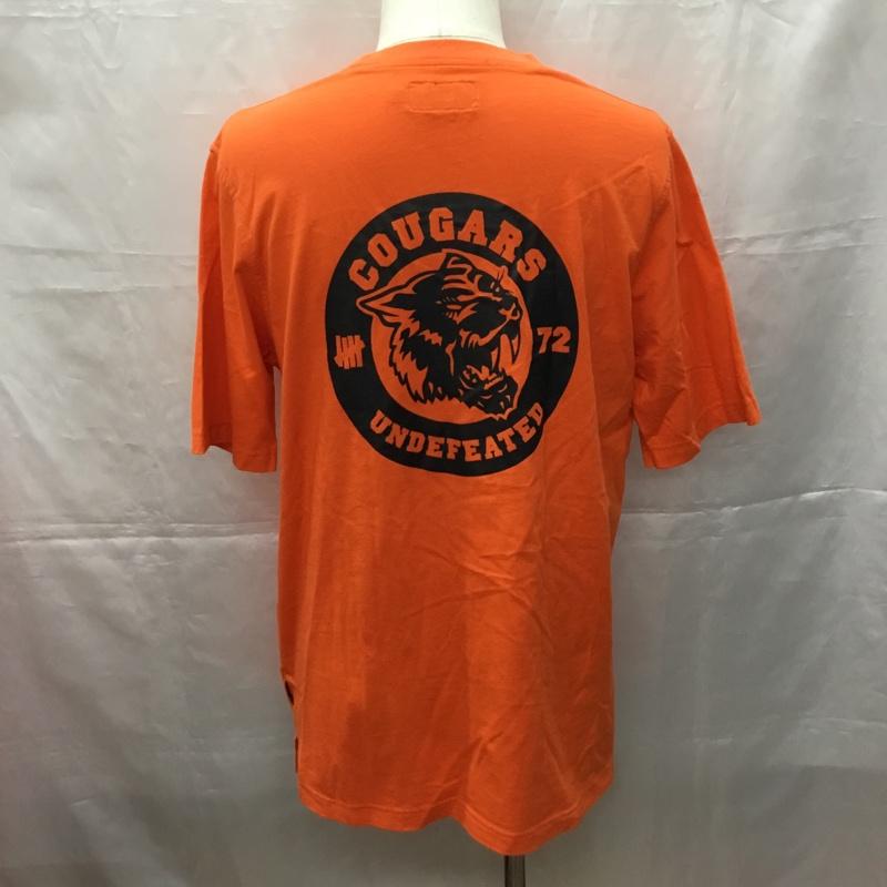 アンディフィーテッド UNDEFEATED Tシャツ 半袖 半袖カットソー プリントTシャツ クルーネックカットソー M プリント 橙 / オレンジ /  メンズ USED 古着 中古 10108964
