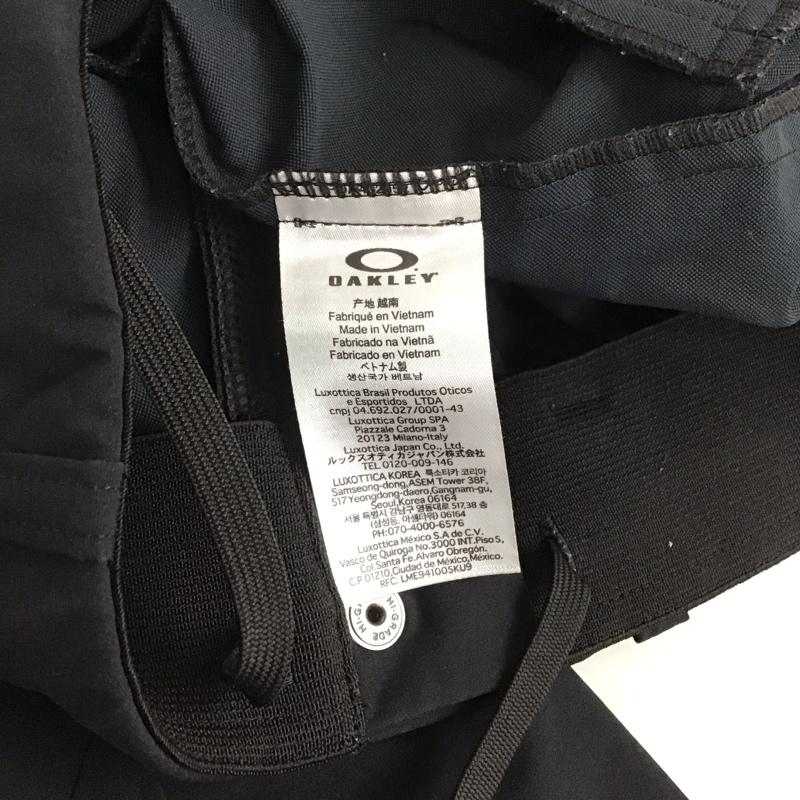 オークリー OAKLEY パンツ ワークパンツ、ペインターパンツ ワークパンツ ワイドパンツ カジュアルパンツ ストレッチ M ロゴ、文字 黒 / ブラック / メンズ USED 古着 中古 10130709