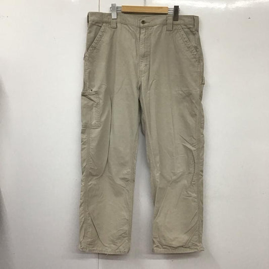 カーハート Carhartt パンツ ワークパンツ、ペインターパンツ ワークパンツ ワイドパンツ カーゴパンツ 38インチ ロゴ、文字 ベージュ / ベージュ /  メンズ USED 古着 中古 10127417