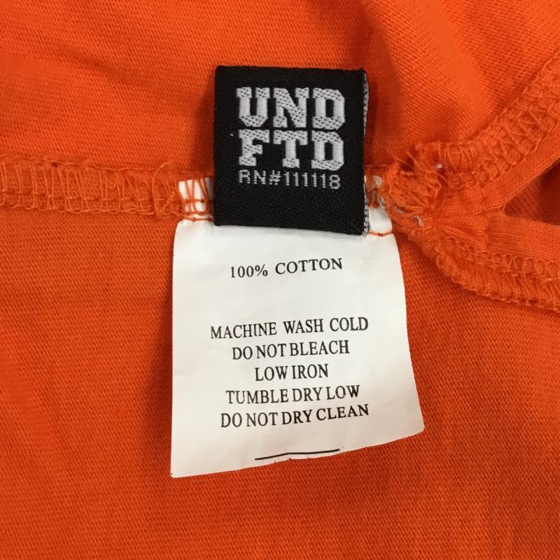 アンディフィーテッド UNDEFEATED Tシャツ 半袖 半袖カットソー プリントTシャツ クルーネックカットソー M プリント 橙 / オレンジ /  メンズ USED 古着 中古 10108964