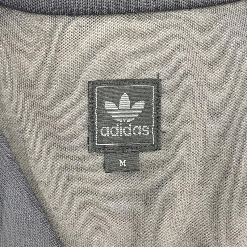 アディダス adidas ジャケット、上着 ジャンパー、ブルゾン E07980 トラックジャケット トレーニングウェア スポーツウェア M ロゴ、文字 黒 / ブラック / メンズ USED 古着 中古 10120990