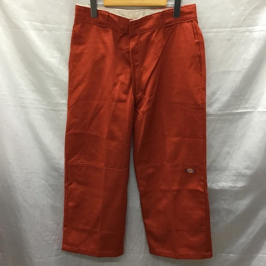 ディッキーズ Dickies パンツ ワークパンツ、ペインターパンツ ワークパンツ ワイドパンツ カジュアルパンツ skateboading 31インチ ロゴ、文字 橙 / オレンジ /  メンズ USED 古着 中古 10121986