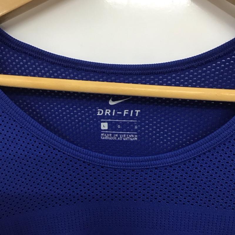 ナイキ NIKE Tシャツ 長袖 AT0783-438 DRI-FIT スポーツウェア メッシュ タグ付き L ワンポイント 青 / ブルー / レディース USED 古着 中古 10135600