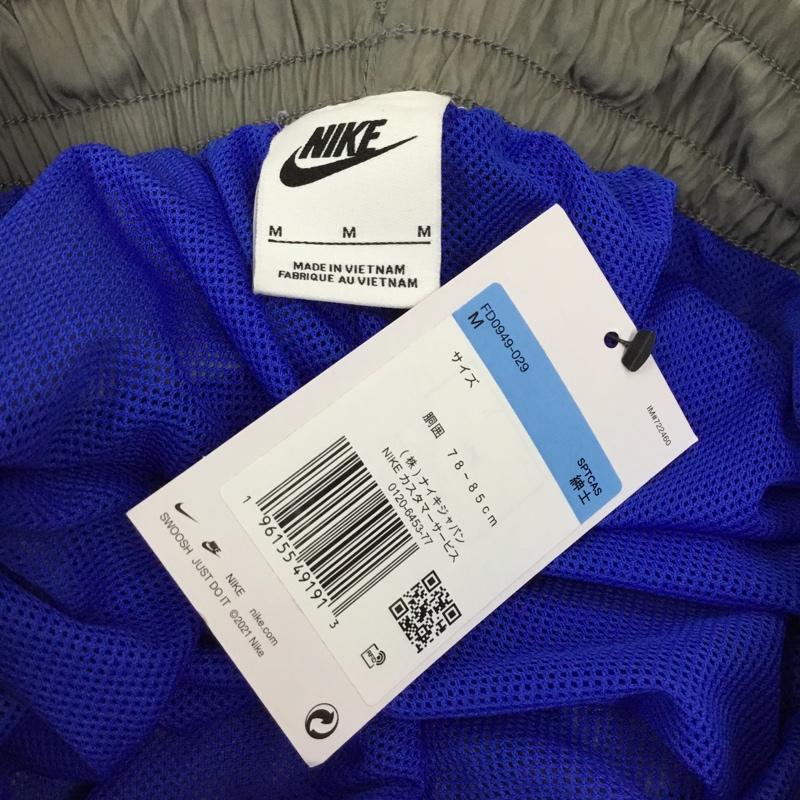 ナイキ NIKE パンツ ワークパンツ、ペインターパンツ fd0949-029 スポーツウェア ナイロンパンツ ワイドパンツ カジュアルパンツ M ロゴ、文字 灰 / グレー / メンズ USED 古着 中古 10110990