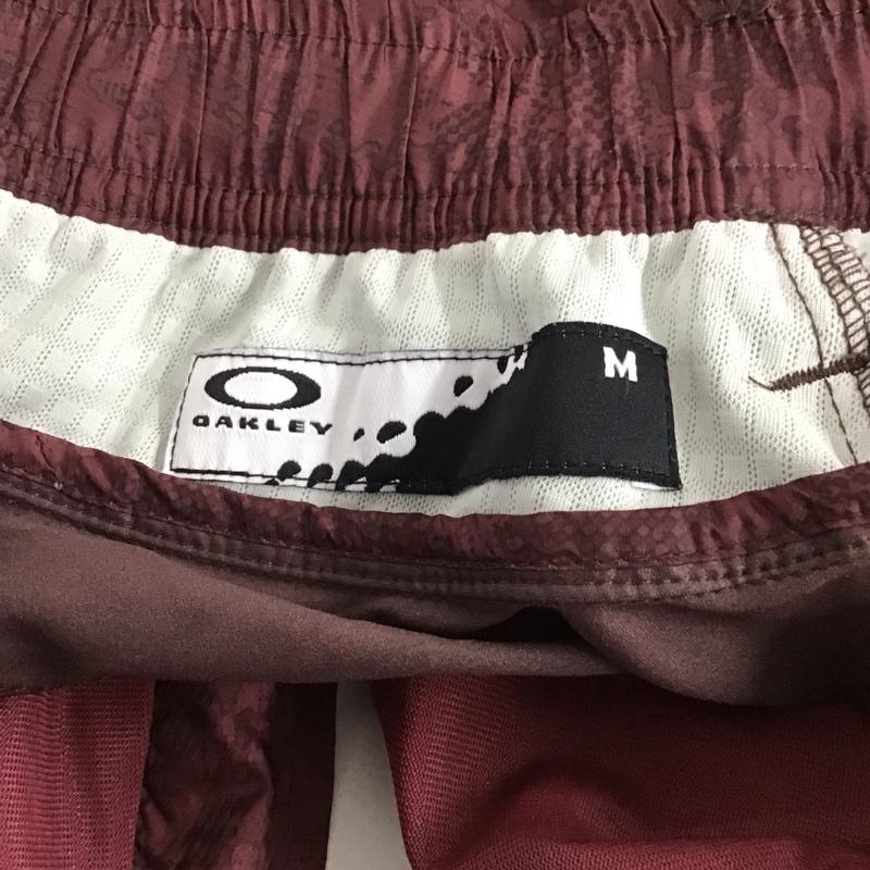 オークリー OAKLEY パンツ ワークパンツ、ペインターパンツ ナイロンパンツ ワイドパンツ カジュアルパンツ M 総柄 えんじ / ワインレッド /  メンズ USED 古着 中古 10126222