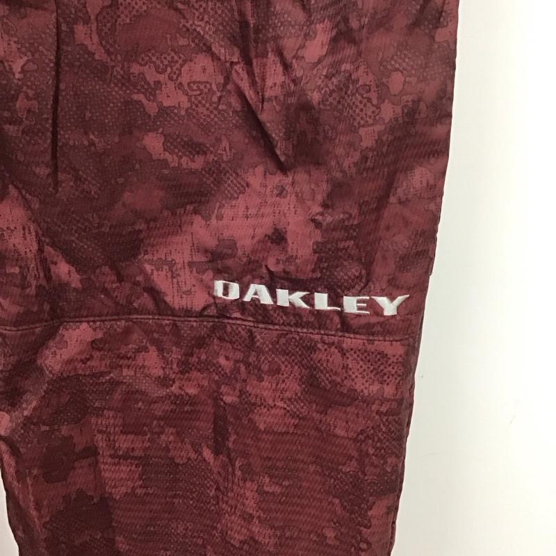 オークリー OAKLEY パンツ ワークパンツ、ペインターパンツ ナイロンパンツ ワイドパンツ カジュアルパンツ M 総柄 えんじ / ワインレッド /  メンズ USED 古着 中古 10126222