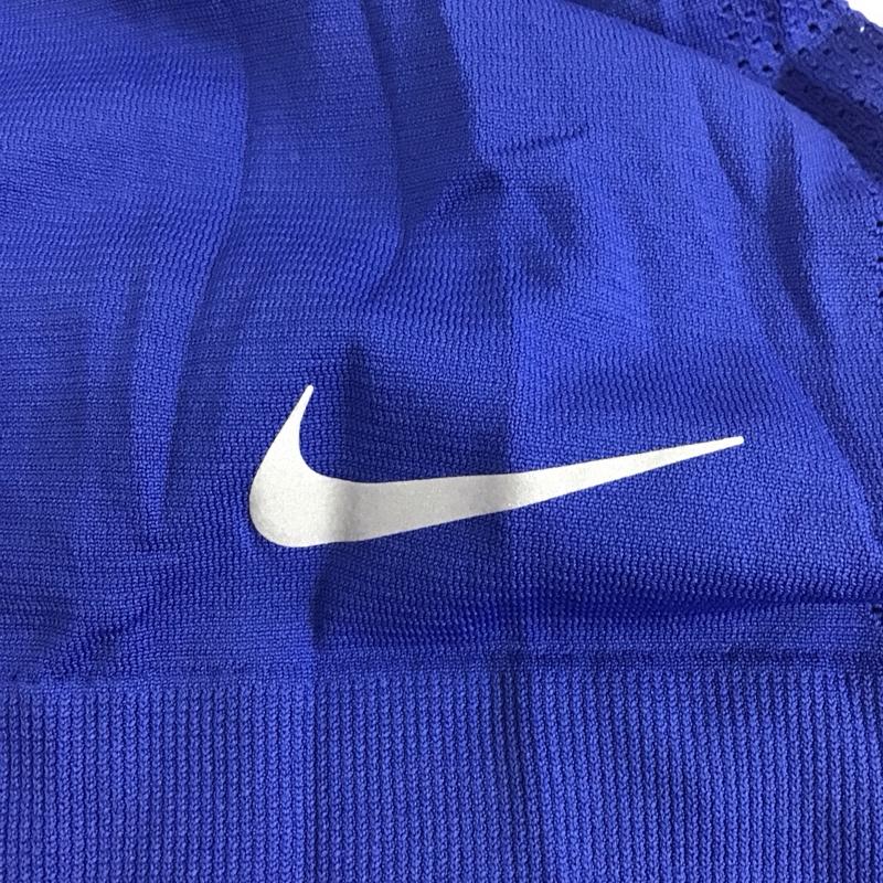 ナイキ NIKE Tシャツ 長袖 AT0783-438 DRI-FIT スポーツウェア メッシュ タグ付き L ワンポイント 青 / ブルー / レディース USED 古着 中古 10135600