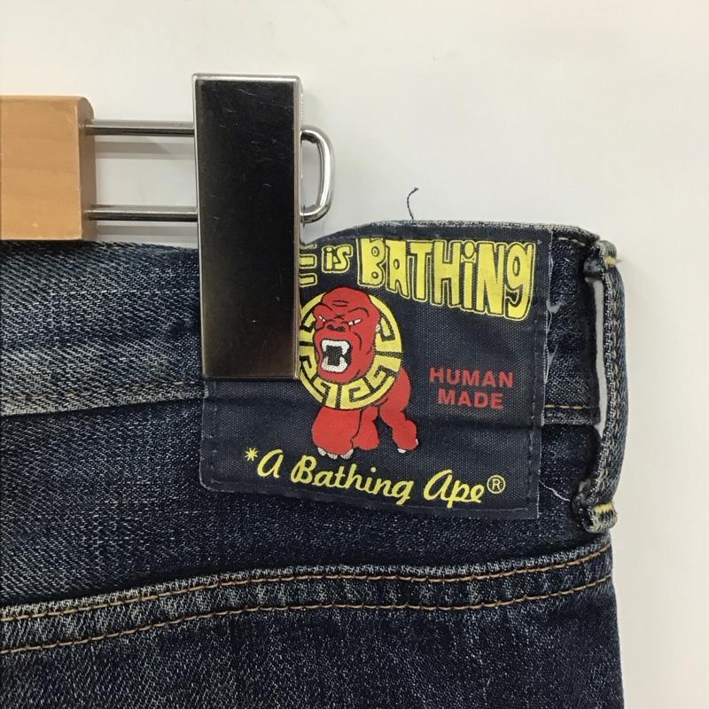 アベイシングエイプ A BATHING APE パンツ デニム、ジーンズ デニムパンツ スリムパンツ カジュアルパンツ 43インチ プリント X ダメージ加工 インディゴ / インディゴ / メンズ USED 古着 中古 10132405