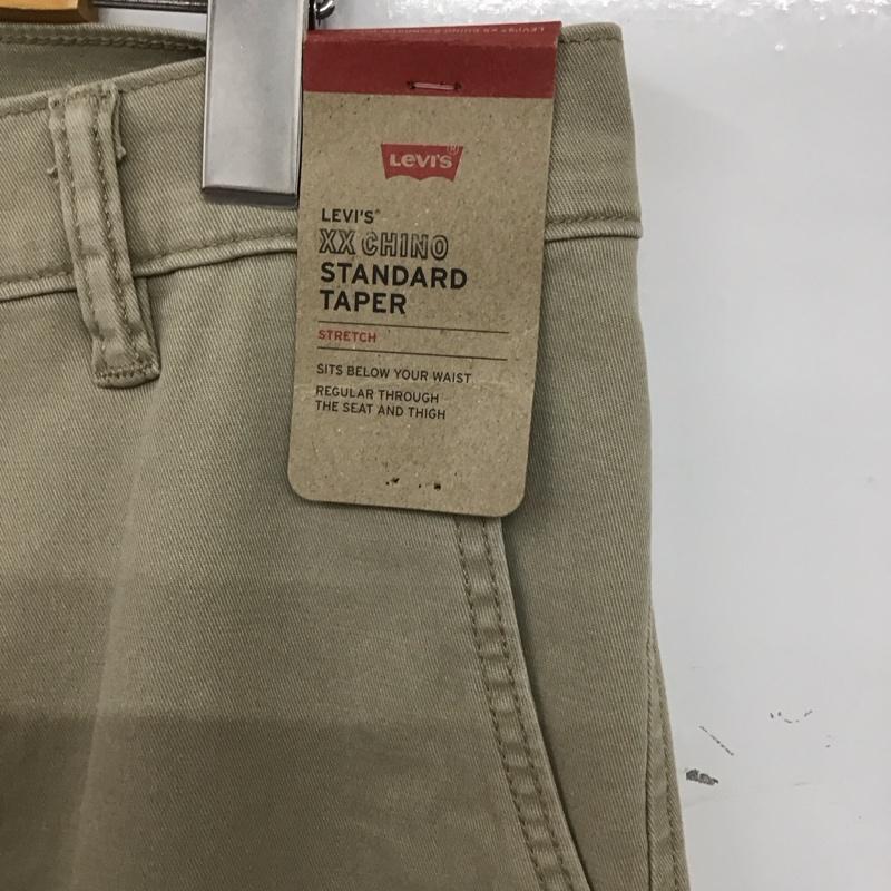リーバイス Levi s パンツ デニム、ジーンズ チノパン スリムパンツ カジュアルパンツ ストレッチパンツ 31インチ 無地 ベージュ / ベージュ / メンズ USED 古着 中古 10139725