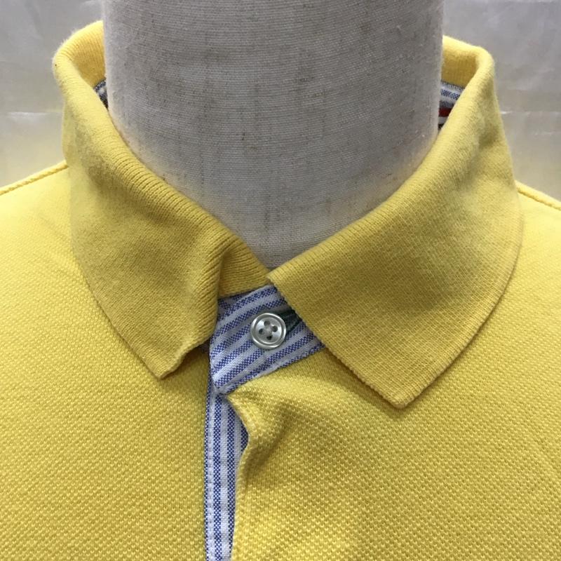トミーヒルフィガー TOMMY HILFIGER ポロシャツ 半袖 半袖ポロシャツ カラーシャツ 半袖カットソー XL ロゴ、文字 黄 / イエロー /  メンズ USED 古着 中古 10113223