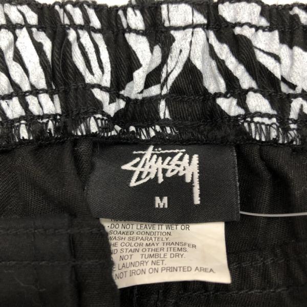 ステューシー STUSSY パンツ ショートパンツ ボトムス パンツ ショートパンツ ボタニカル柄 タグ付き M 総柄 白 / ホワイト / X 黒 / ブラック / メンズ USED 古着 中古 10026100