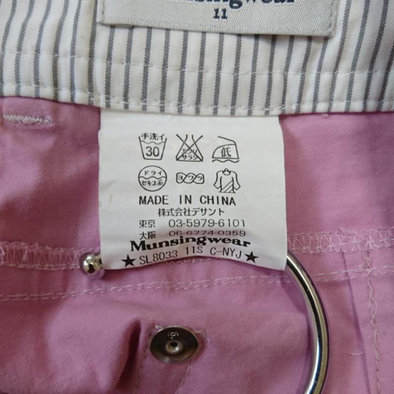 マンシングウェア Munsingwear パンツ チノパン ゴルフウエア 無地 X ワンポイント 桃 / ピンク / レディース USED 古着 中古 10036677
