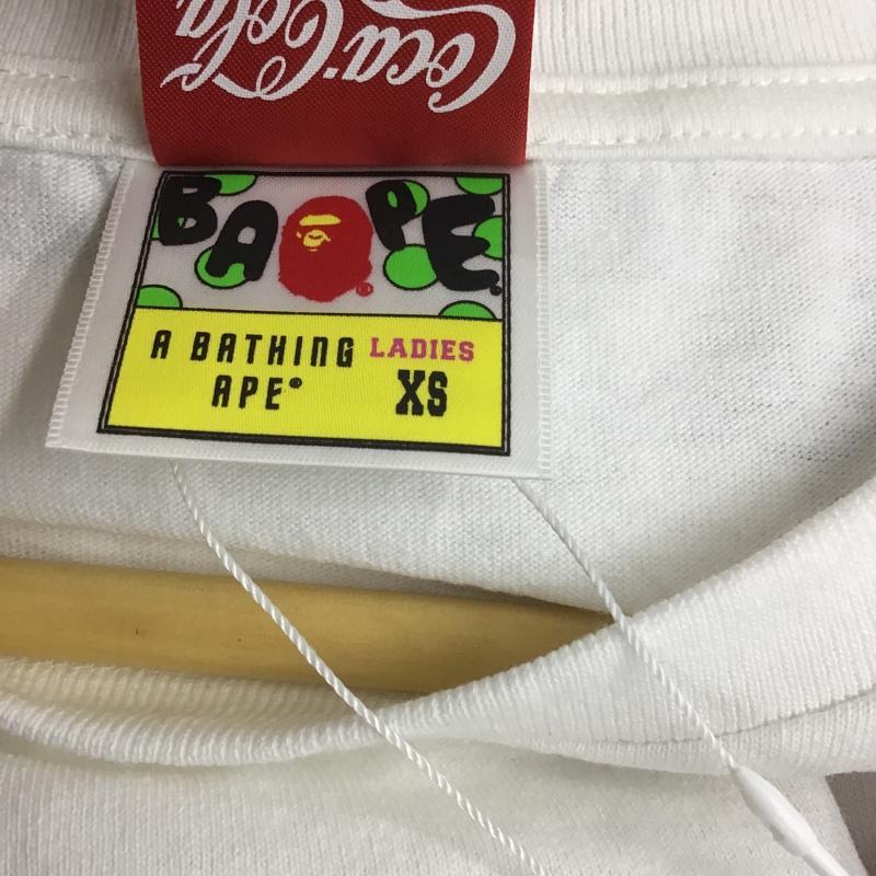 アベイシングエイプ A BATHING APE Tシャツ 半袖 コカ・コーラ タグ付 COCA-COLA XS ロゴ、文字 X プリント 白 / ホワイト / レディース USED 古着 中古 10081678