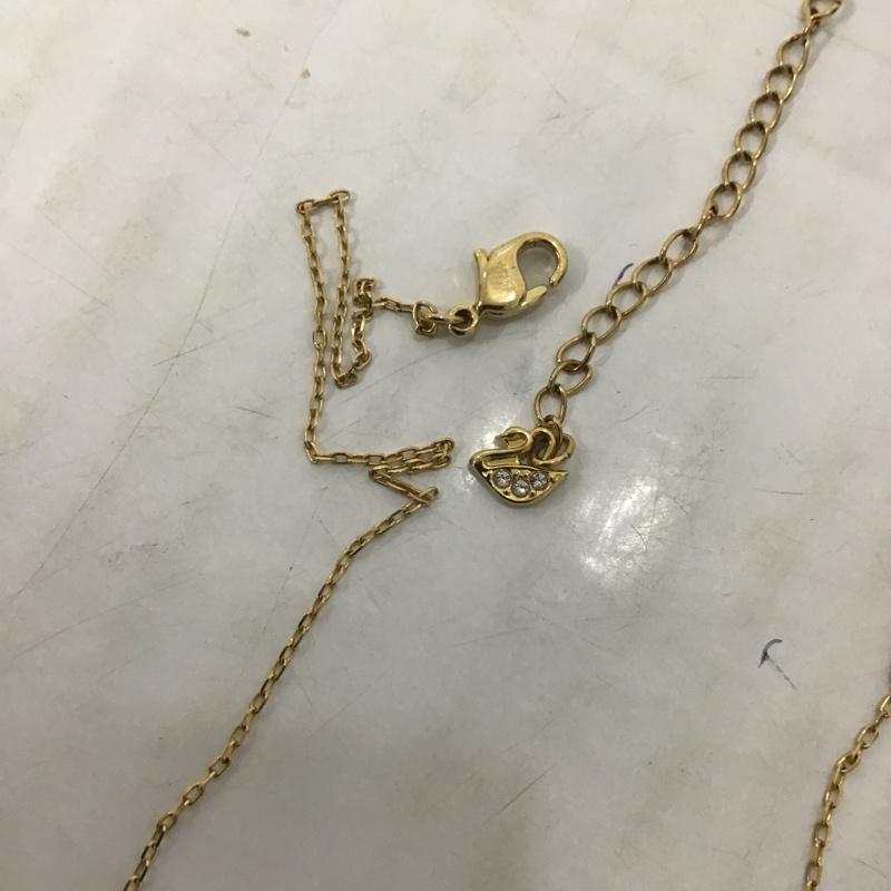 スワロフスキー SWAROVSKI アクセサリー ネックレス、ペンダント 無地 金 / ゴールド / レディース USED 古着 中古 10086101