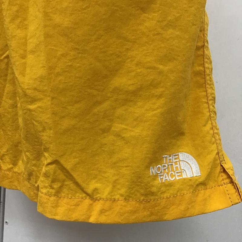 ザノースフェイス THE NORTH FACE パンツ ショートパンツ NB42051 バーサタイルショーツ ナイロンパンツ M ロゴ、文字 X 刺繍 黄 / イエロー / メンズ USED 古着 中古 10090991