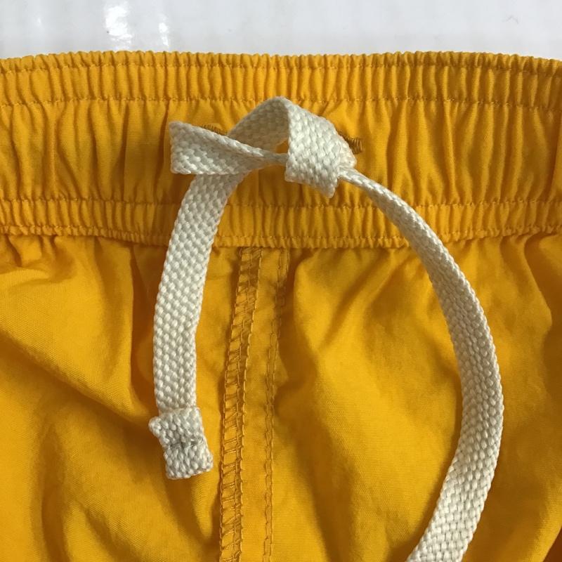 ザノースフェイス THE NORTH FACE パンツ ショートパンツ NB42051 バーサタイルショーツ ナイロンパンツ M ロゴ、文字 X 刺繍 黄 / イエロー / メンズ USED 古着 中古 10090991