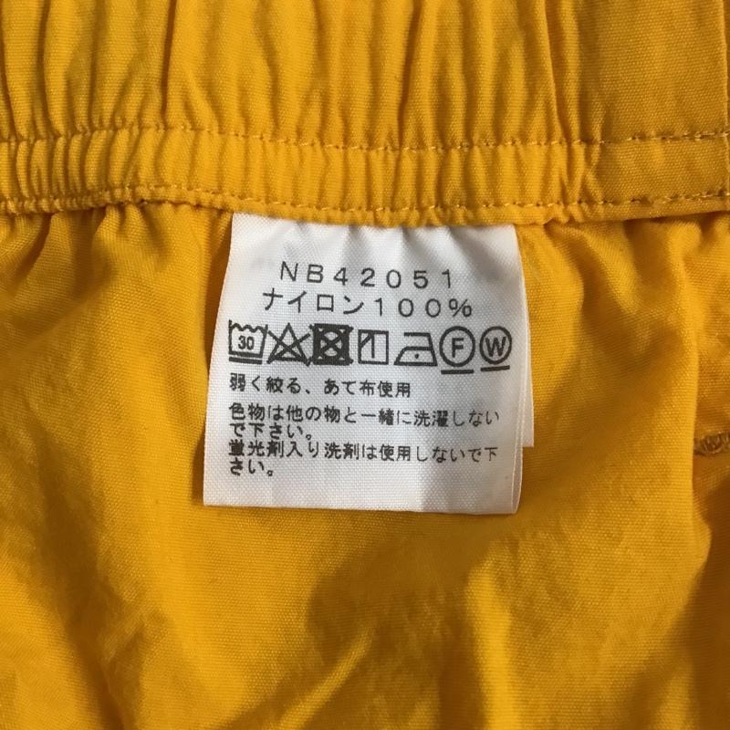 ザノースフェイス THE NORTH FACE パンツ ショートパンツ NB42051 バーサタイルショーツ ナイロンパンツ M ロゴ、文字 X 刺繍 黄 / イエロー / メンズ USED 古着 中古 10090991