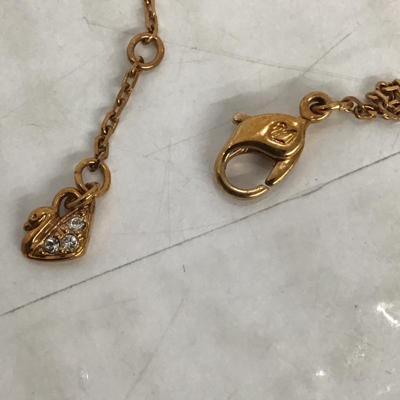 スワロフスキー SWAROVSKI アクセサリー ネックレス、ペンダント しずく 無地 金 / ゴールド / X 紫 / パープル / レディース USED 古着 中古 10098504