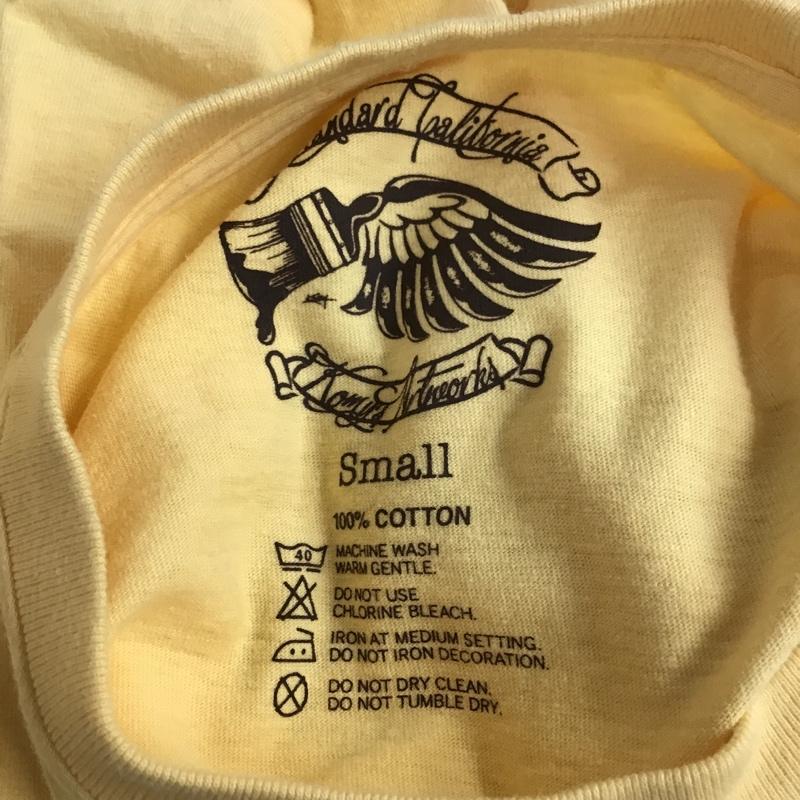 スタンダード カリフォルニア STANDARD CALIFORNIA Tシャツ 半袖 半袖カットソー プリントTシャツ クルーネックカットソー S ロゴ、文字 黄 / イエロー / メンズ USED 古着 中古 10105399